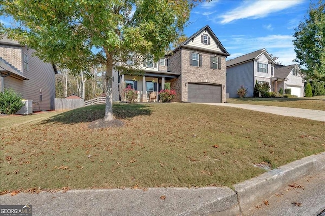 view of front of house with central air condition unit, a front yard, and a garage