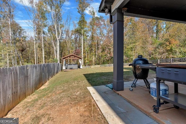 view of yard with a gazebo and a patio