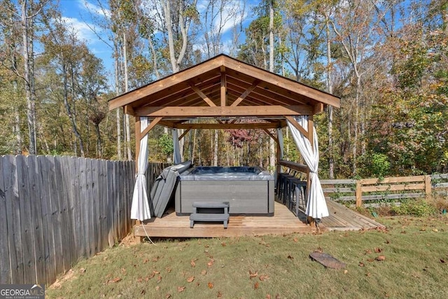 view of parking / parking lot with a gazebo and a yard