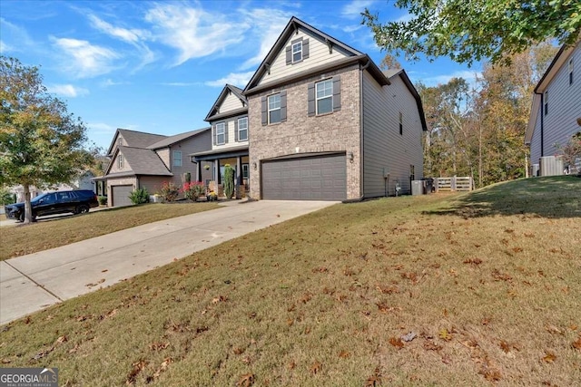 view of front facade featuring a garage and a front lawn