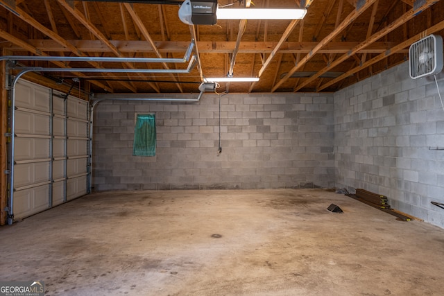 garage featuring a garage door opener