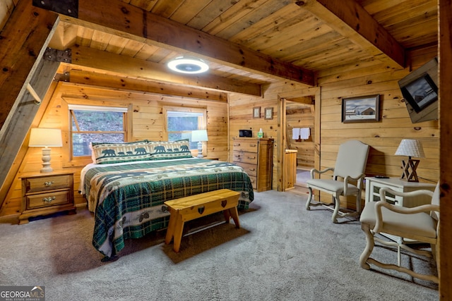 carpeted bedroom featuring beamed ceiling, wooden walls, and wood ceiling