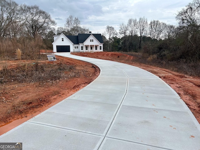 exterior space with a garage