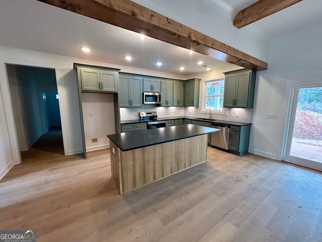 kitchen featuring sink, light hardwood / wood-style flooring, backsplash, stainless steel appliances, and beamed ceiling