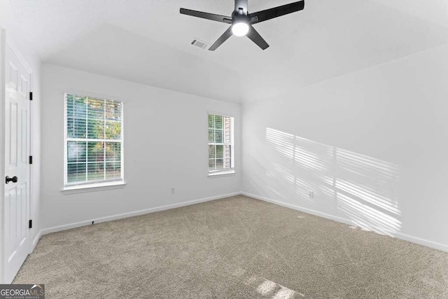 empty room with carpet and ceiling fan