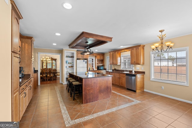 402 Brannen Dr, Statesboro, GA 30458 - kitchen featuring a chandelier, stainless steel dishwasher, freestanding refrigerator, dark countertops, and a sink
