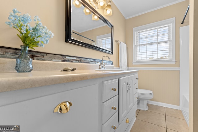 full bathroom with bathtub / shower combination, toilet, vanity, crown molding, and tile patterned floors