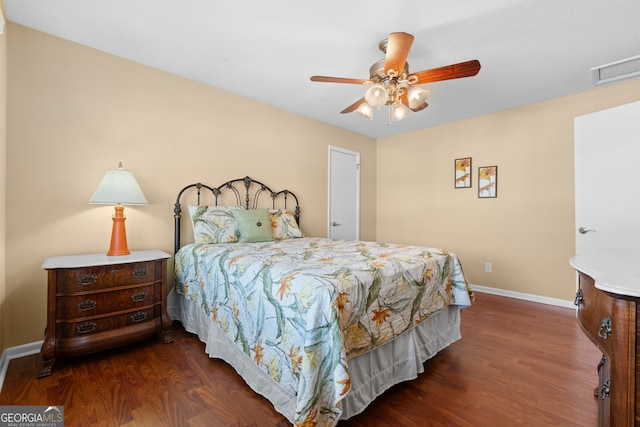 bedroom featuring dark wood-type flooring and ceiling fan