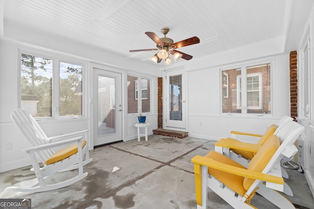 sunroom / solarium with ceiling fan