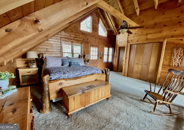 bedroom with wood walls, high vaulted ceiling, wooden ceiling, carpet floors, and beamed ceiling