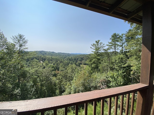 mountain view featuring a view of trees