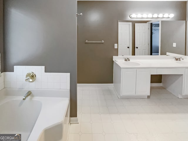 bathroom with vanity and a bathtub