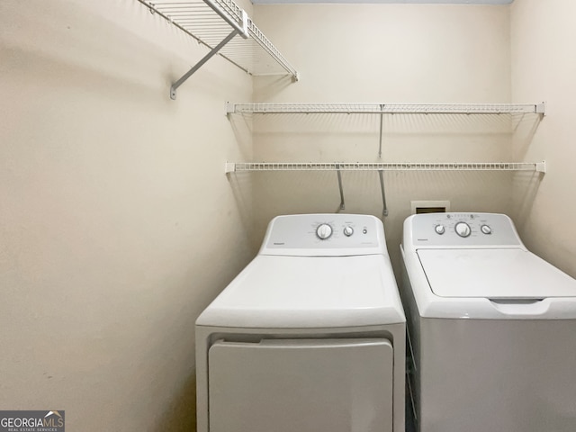 laundry area featuring washer and clothes dryer