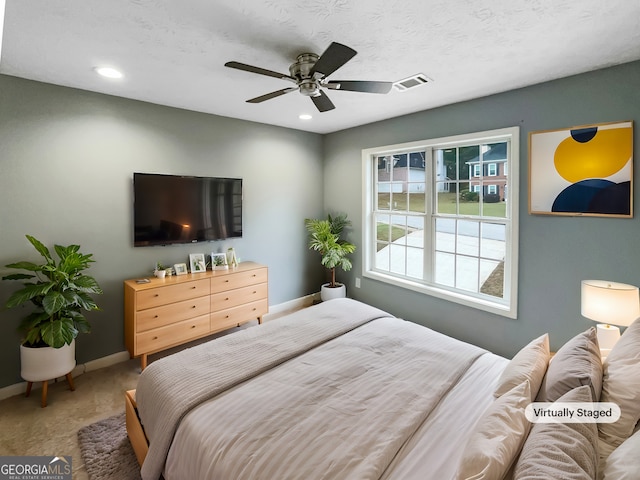 bedroom with carpet flooring and ceiling fan