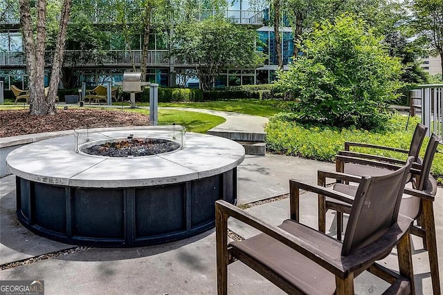 view of patio / terrace featuring a fire pit