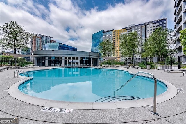 view of swimming pool featuring a patio