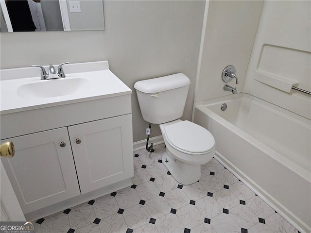 bathroom with shower / tub combination, vanity, toilet, and baseboards