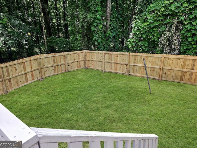 view of yard with a fenced backyard