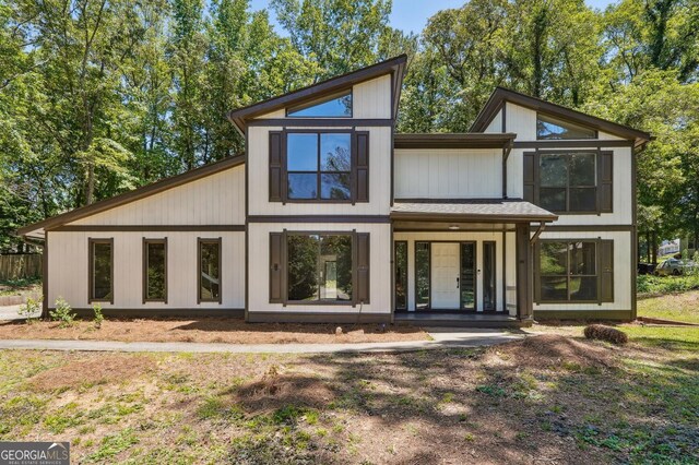 rear view of house with a patio