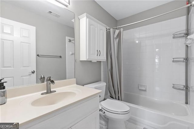 full bathroom with tile patterned floors, vanity, toilet, and shower / tub combo with curtain