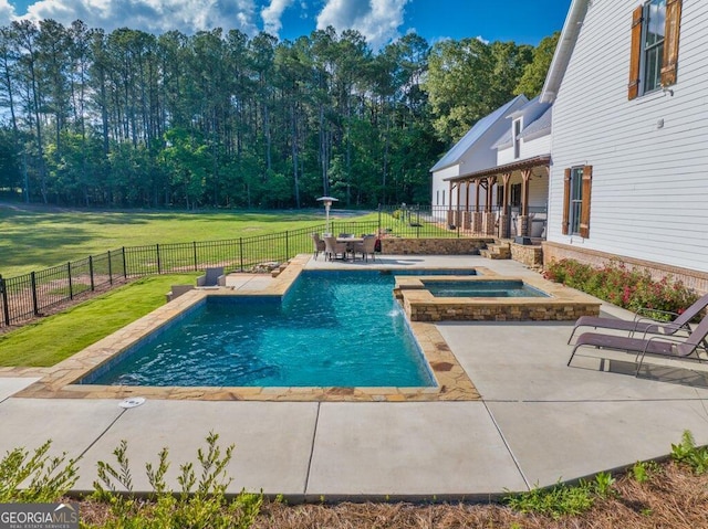 view of pool featuring a patio, a fenced backyard, an in ground hot tub, a yard, and a fenced in pool