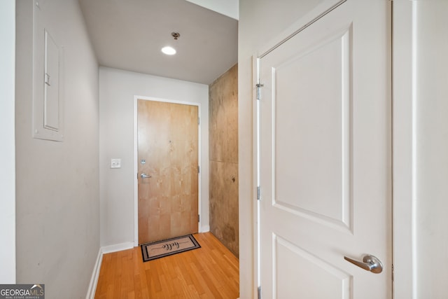 doorway to outside featuring wood-type flooring