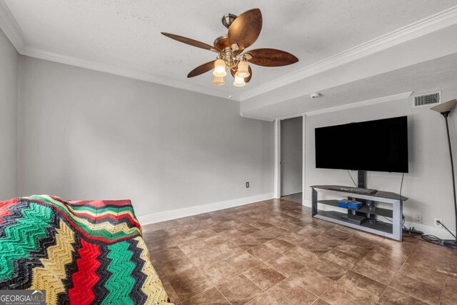 unfurnished room with ornamental molding, a textured ceiling, and ceiling fan