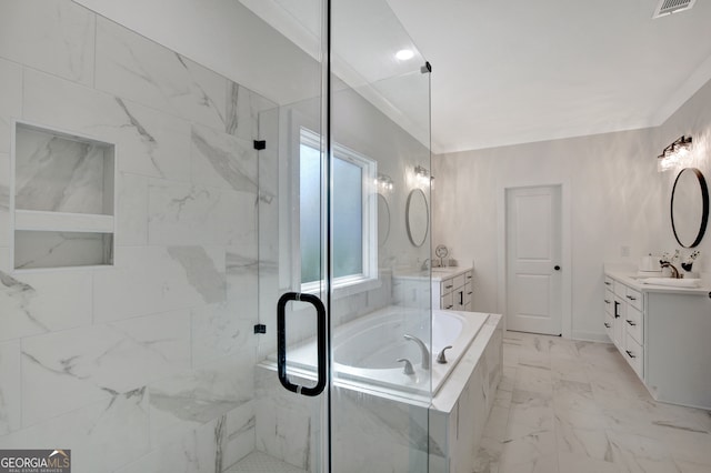 bathroom featuring vanity and separate shower and tub