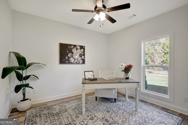 office area with hardwood / wood-style flooring and ceiling fan