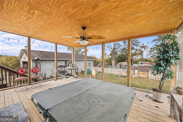 wooden deck with ceiling fan