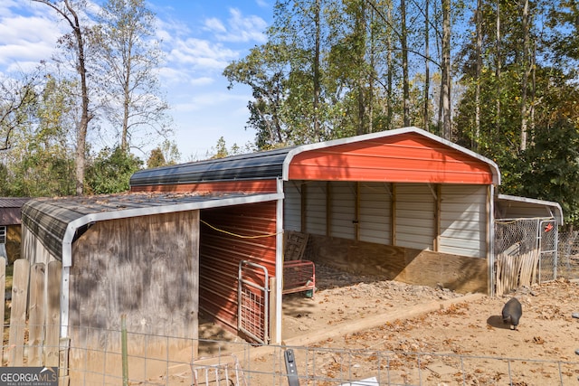 view of outdoor structure with a carport