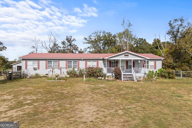 view of front of property with a porch and a front lawn