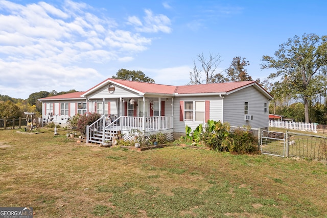 view of front facade with a front lawn and covered porch