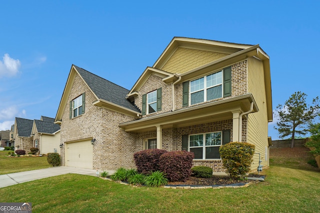 view of front of house with a front lawn and a garage