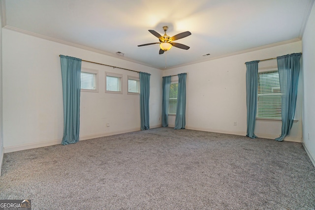 unfurnished room featuring crown molding, carpet floors, and ceiling fan