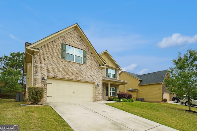 view of front of home featuring cooling unit, a front lawn, and a garage