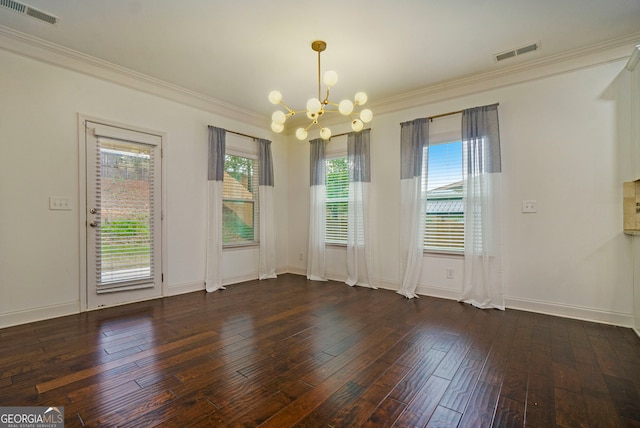 unfurnished room with crown molding, dark hardwood / wood-style floors, and a notable chandelier