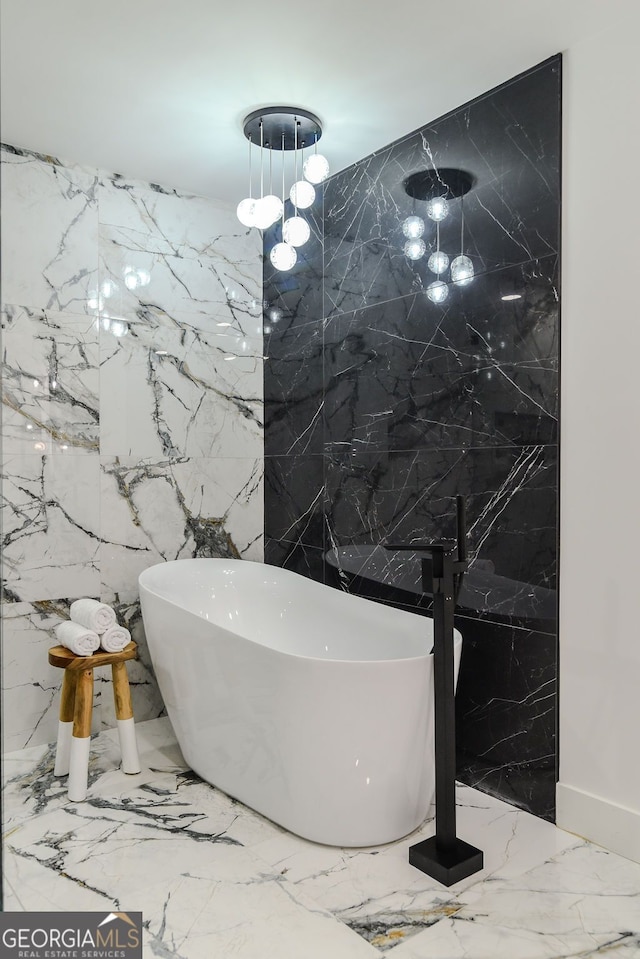 bathroom featuring a bathing tub and tile walls