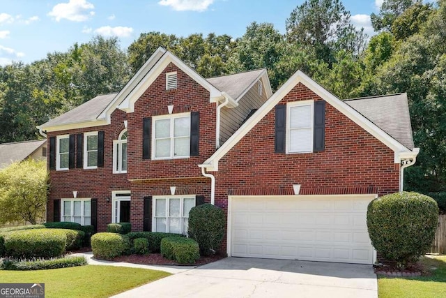 view of front of property with a garage