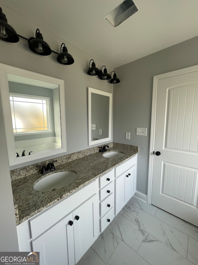 bathroom featuring vanity