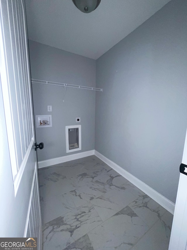 clothes washing area featuring electric dryer hookup and washer hookup