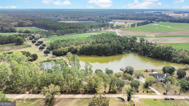 bird's eye view with a rural view and a water view