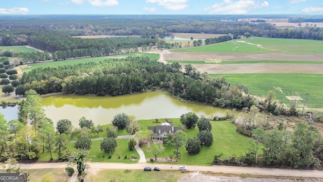 aerial view featuring a rural view and a water view