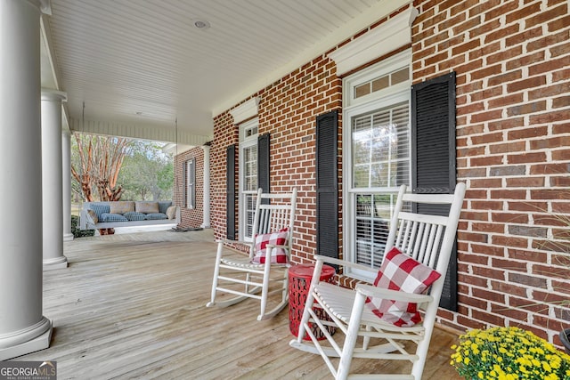 deck featuring a porch