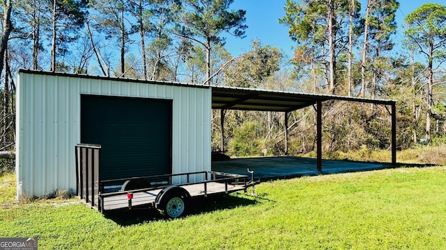 view of outbuilding with a lawn