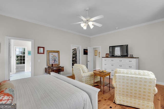 bedroom featuring ceiling fan, light wood-type flooring, and ornamental molding