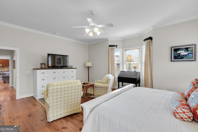 bedroom with ceiling fan, light hardwood / wood-style floors, and ornamental molding