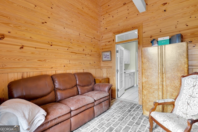 living room with wooden walls