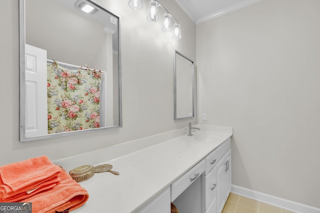 bathroom with vanity and ornamental molding