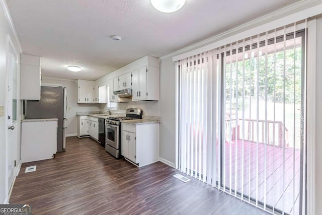 kitchen with sink, dark hardwood / wood-style flooring, stainless steel appliances, white cabinets, and crown molding